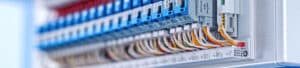 Close up photo of a neatly wired electrical breaker box